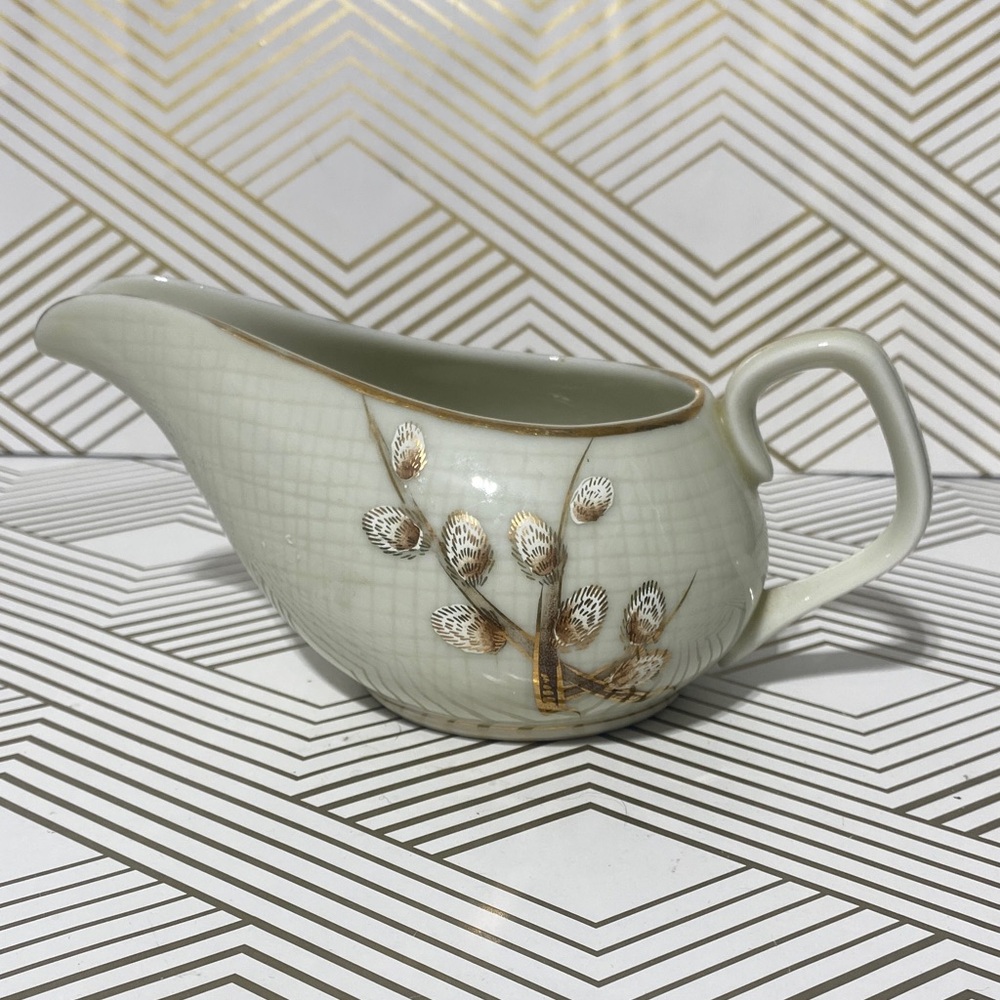 Elegant Cream and Gold Ceramic Pourer